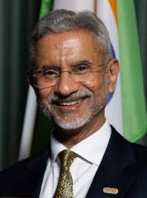 Close portrait of Dr. S. Jaishankar in a dark suit and patterned tie, smiling